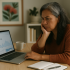 common SEO mistakes: A middle-aged New Zealand woman of Polynesian descent sits at a tidy desk with a laptop showing a website analytics dashboard with low results. She looks concerned but focused, with a coffee cup and notepad on the desk, symbolising problem-solving and the potential for SEO-driven growth.